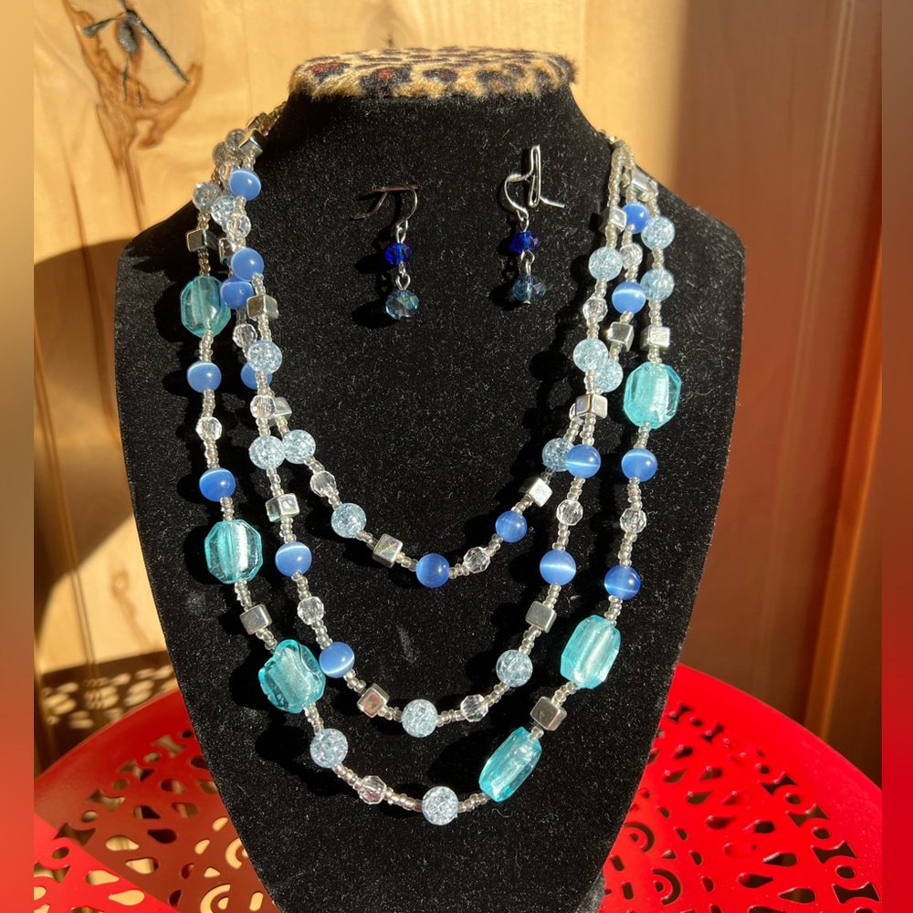 Necklace and earrings, blue beads.